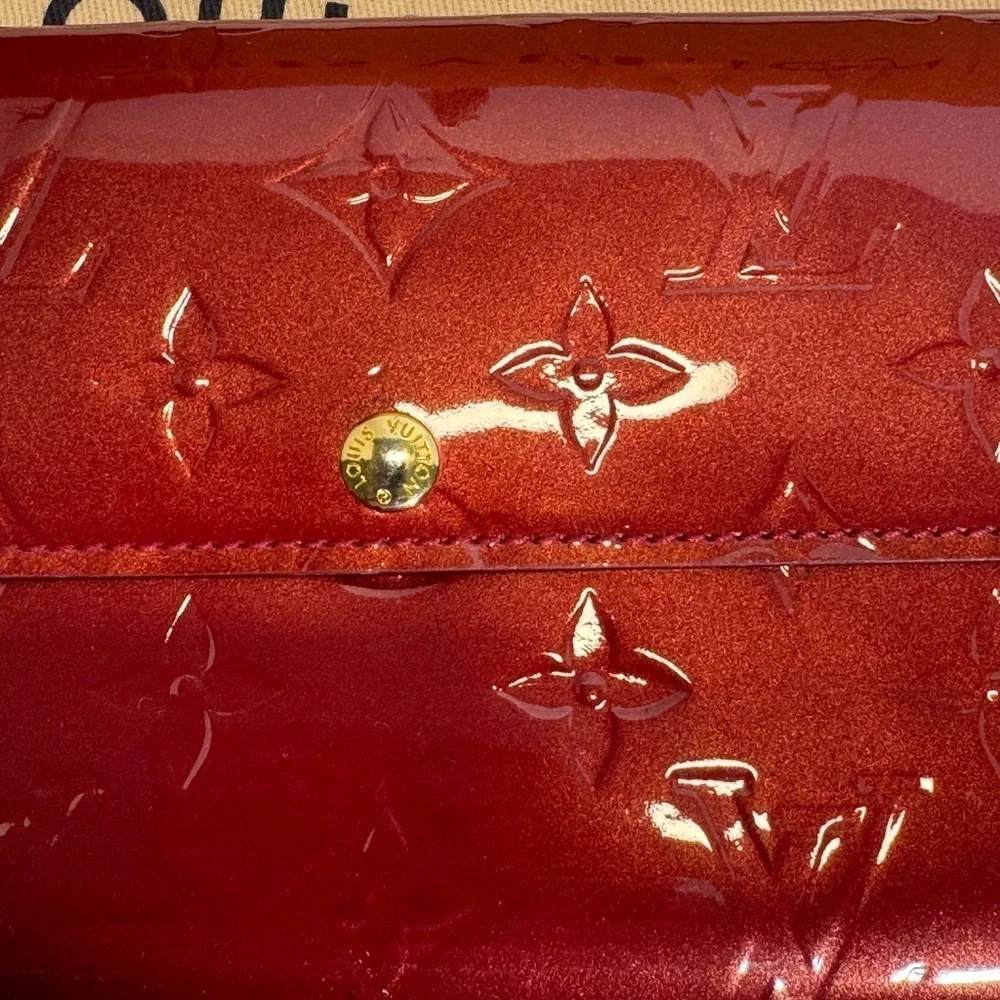 AUTHENTIC Louis Vuitton Red Wallet with Monogram Embossing